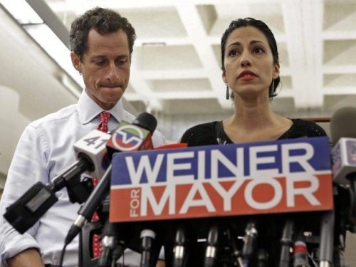 Disgraced: Anthony Weiner and his wife, Huma Abedin